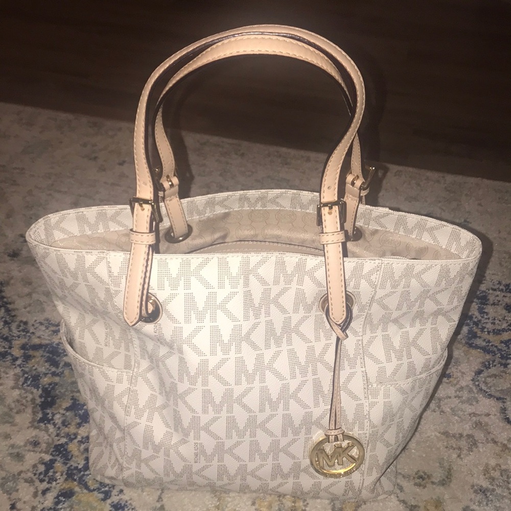 Michael Kors beige and cream tote gold hardware